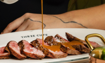 Dubai Just Got The Coziest New Steakhouse with Vintage Charm - Welcome To THREE CUTS